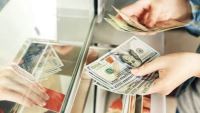تراجع سعر الدولار خلال تعاملات اليوم ويسجل 50.57 جنيه للبيع بالبنك الأهلي المصري