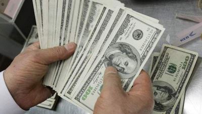 الدولار يفقد 6 قروش في "عوده" ويسجل 15.50 جنيهًا في 4 بنوك